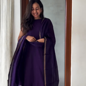 Crushing over this rich purple kurta set and emerald green jewellery